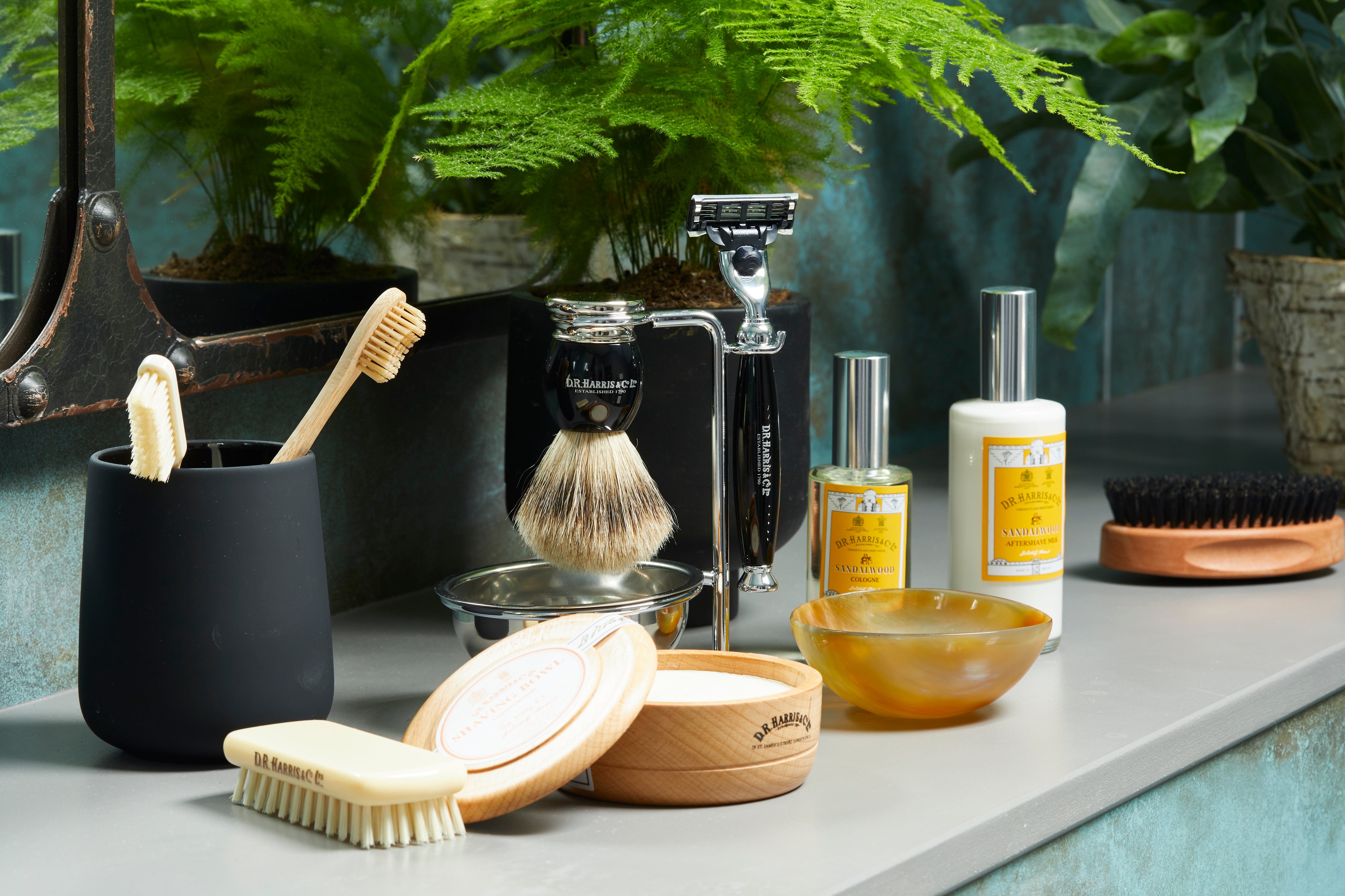 assortment of d.r. harris products on a bathroom shelf